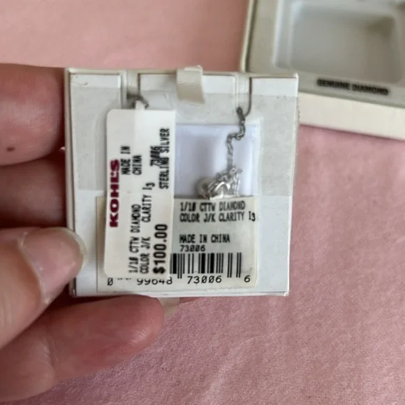 New with tags sterling silver cross necklace with 1/10 cttw diamonds. - Picture 3 of 3